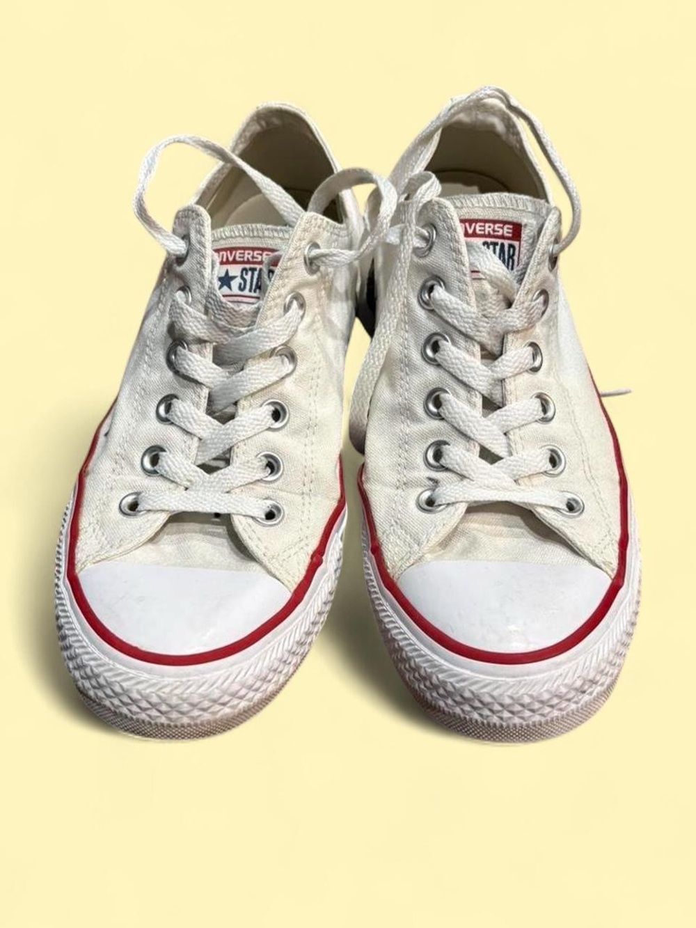 Converse Low Top Sneakers in White with Red Accents